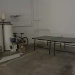 garaje bicicleta caldera mesa ping pong